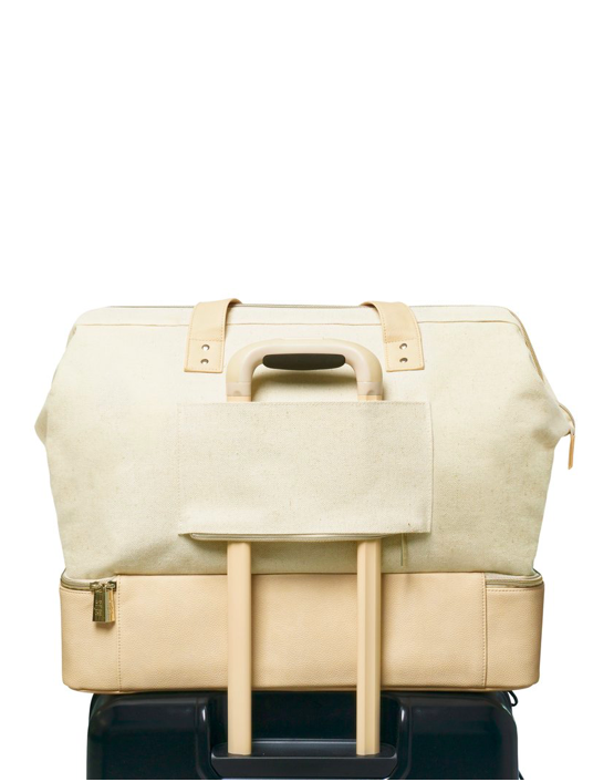 shay Mitchell beis travel beige the weekender